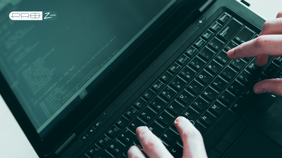 A person works on the computer.